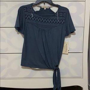 Never been worn. Tags still on.